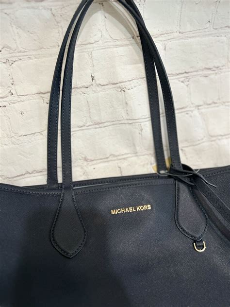 michael michael kors michael michael kors saige medium reversible|Michael Kors handbags.